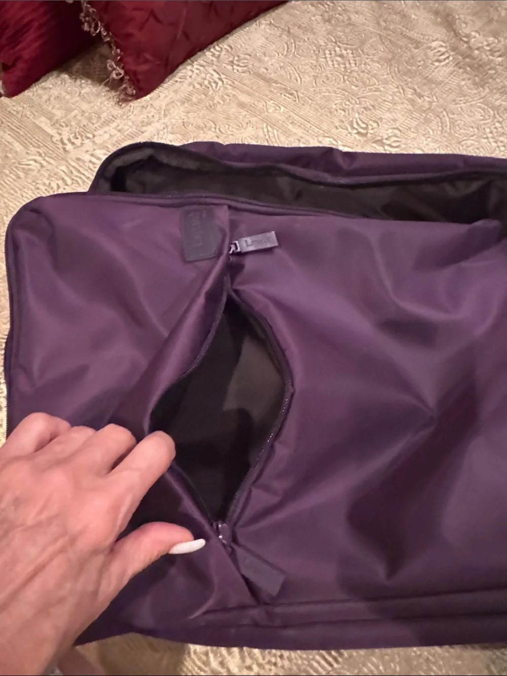 Lipault Men or Wonen’s Rolling Duffel in Deep Plum